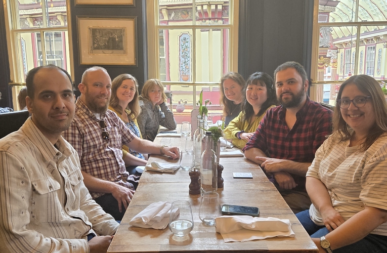 Image of the a group of people having lunch at a restaurant